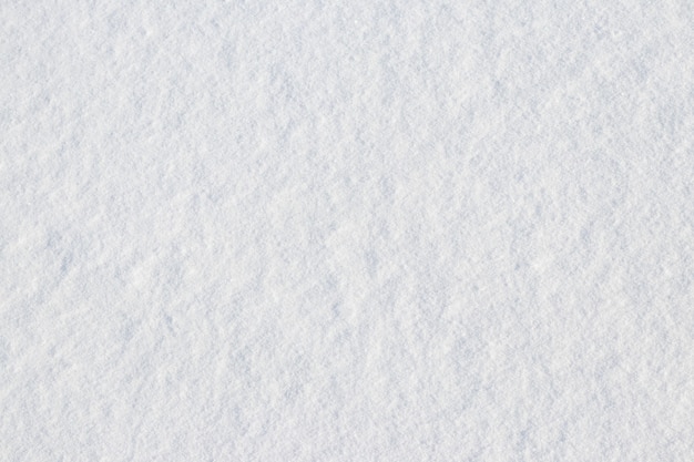 Photo fractional snow texture on a flat surface, winter background
