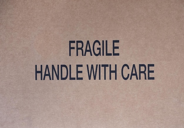 Photo fragile handle with care sign