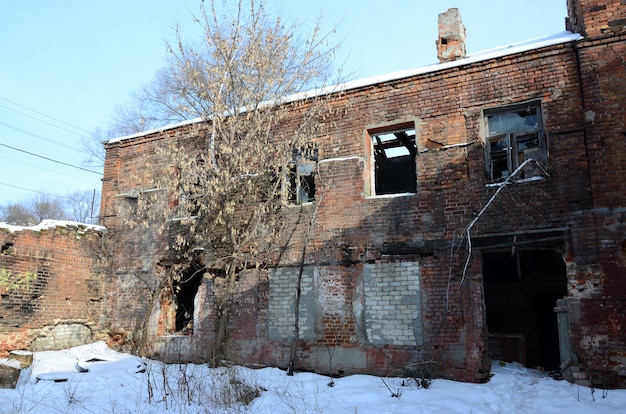 Fragment of an abandoned two-story building after military operations in Donetsk