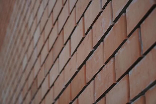 A fragment of a ceramic brick wall closeup