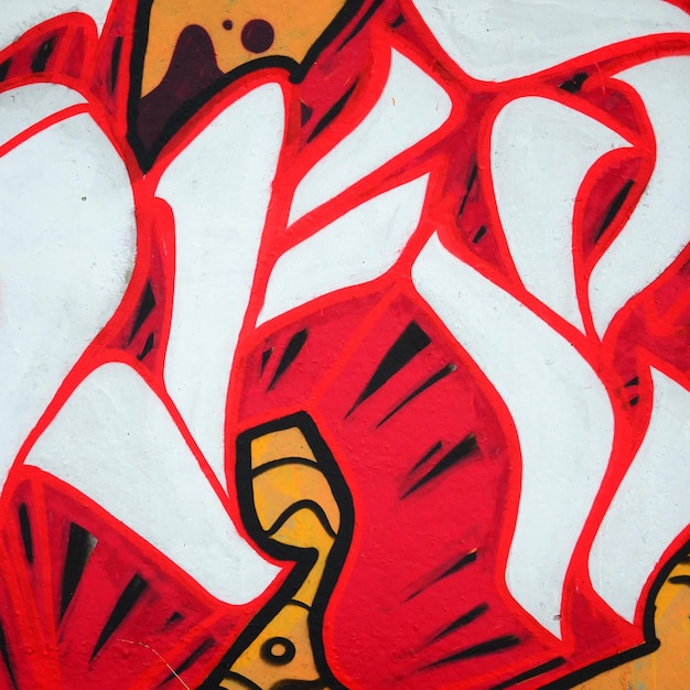 Fragment of colored street art graffiti paintings with contours and shading close up