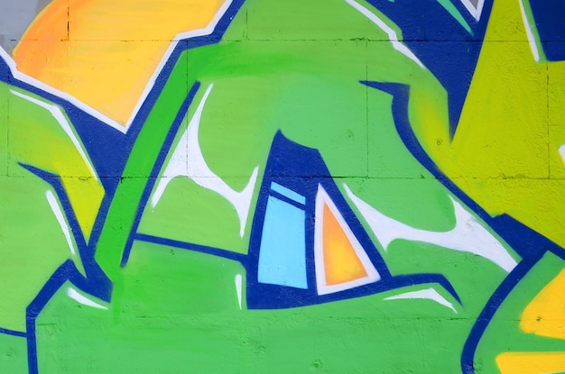 Fragment of colored street art graffiti paintings with contours and shading close up