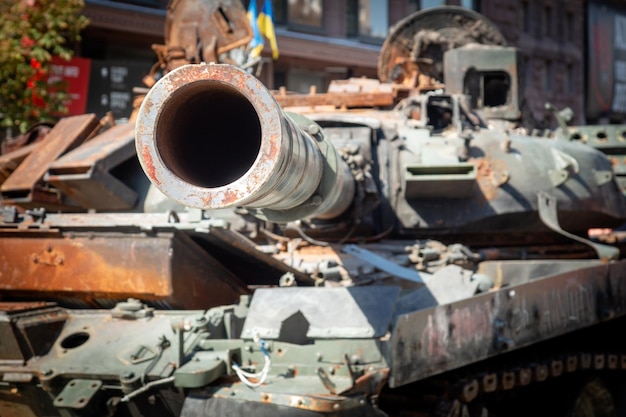 Fragment of a destroyed Russian military tank during the war in Ukraine Muzzle closeup