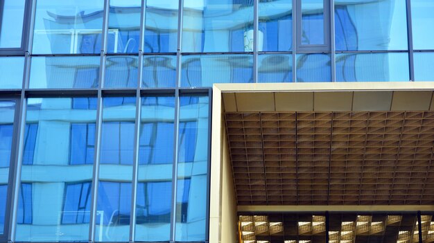 Fragment of glass and metal facade walls commercial office buildings abstract modern business