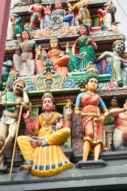 Fragment of highly decorated entrance gate of Sri Mariamman Temple located in Chinatown. This temple is oldest and most famous Hindu temple in Singapore.
