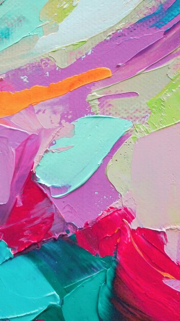 Fragment of multicolored texture painting Abstract art background oil on canvas Rough brushstrokes of paint Closeup of a painting by oil and palette knife Highlytextured high quality details