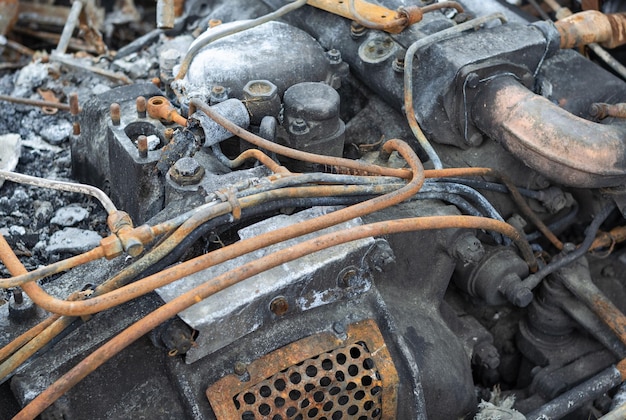 Fragment of a rusty diesel engine