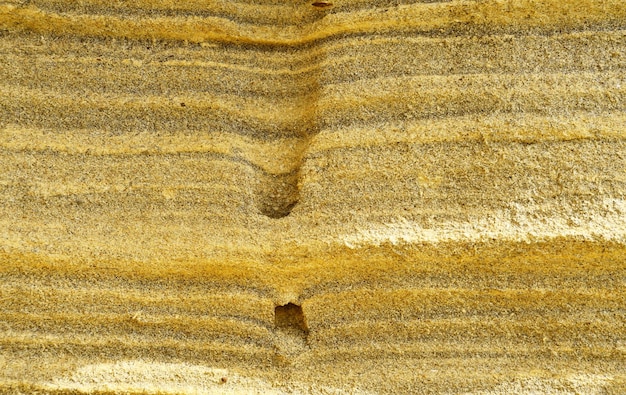 Fragment of sandstone background texture, natural material, abstract drawing.Material for designer.