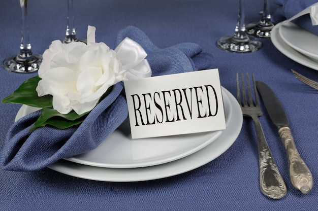 Fragment table setting decorated with flower napkin