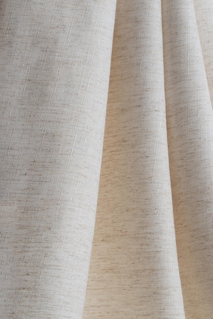 fragment of twill weave cotton fabric natural color