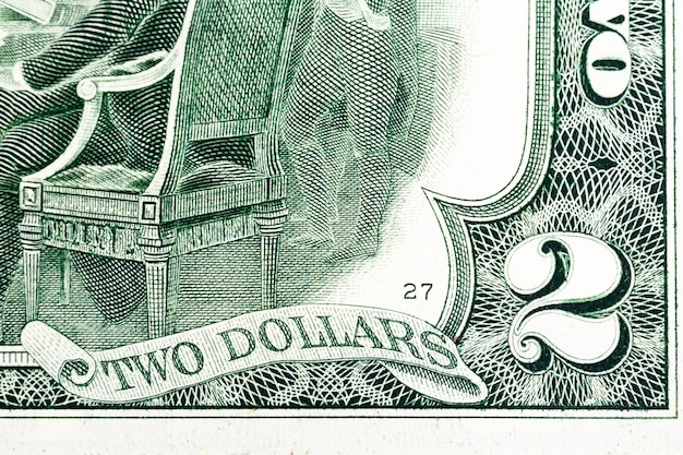 Fragment of two dollar bill. Macro shot. High resolution photo.