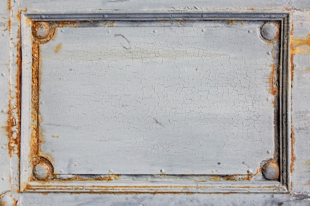 Fragment van een oude houten deur Achtergrond voor een ontwerp van een verzadigde grijze kleur