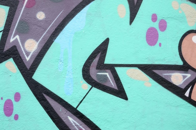 Fragment van gekleurde straatkunst graffiti schilderijen met contouren en schaduwen close-up