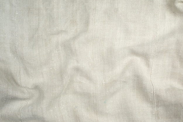 Photo fragment of a very old linen homespun fabric