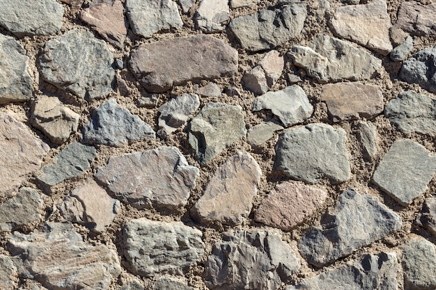 Fragment of a wall from a chipped stone background