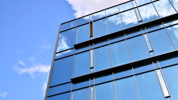 Fragments of building in business district of modern city highrise office building in downtown