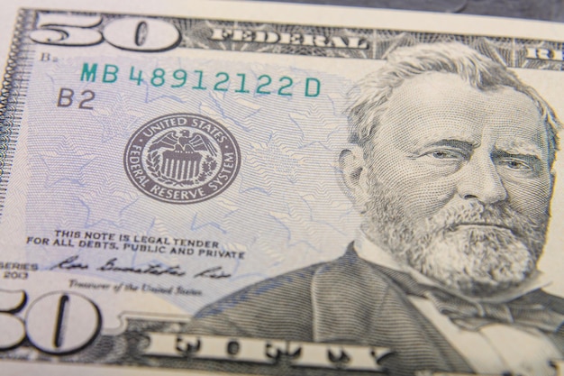 Фрагменты долларовых банкнот на поверхности очень крупным планом Горизонтальный