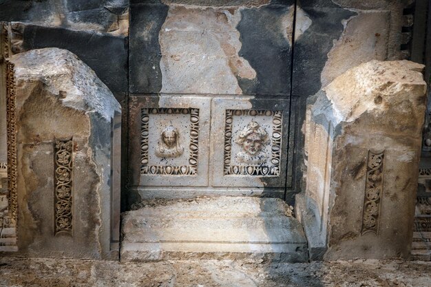 Fragments of interior decoration of ancient roman amphitheatre in Aspendos Turkey