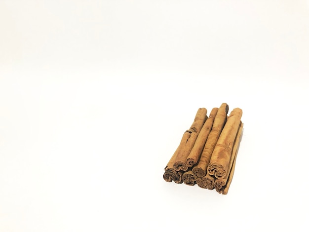 Fragrant cinnamon sticks on a white background