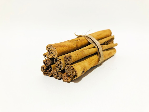 Fragrant cinnamon sticks on a white background