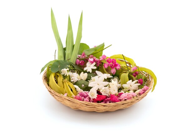 Fragrant flowers such as ylang-ylang flower, rose, jasmine and\
pandanus green leaves isolated.