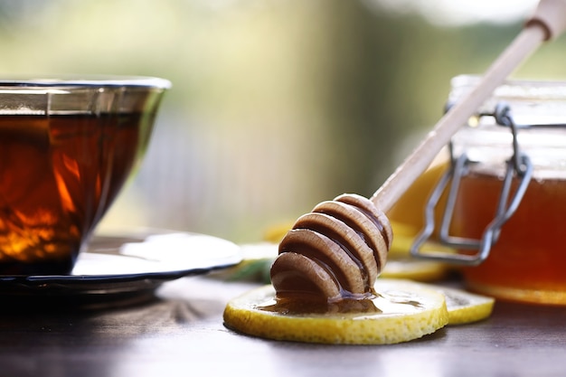 A fragrant fresh honey with a cup of black tea