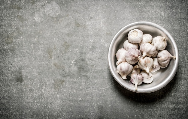 Fragrant garlic in a metal bowl