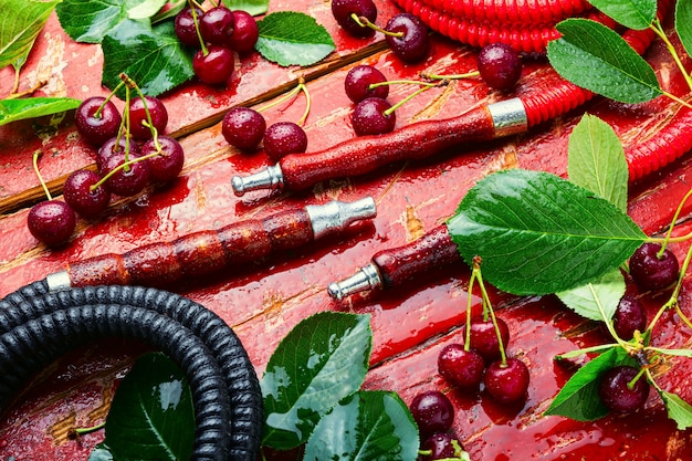 Fragrant smoking hookah with cherry tobacco.Asian tobacco hookah.