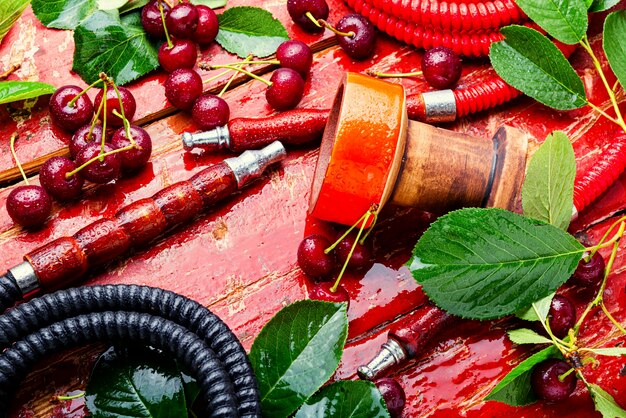 Fragrant smoking hookah with cherry tobacco.Asian tobacco hookah.