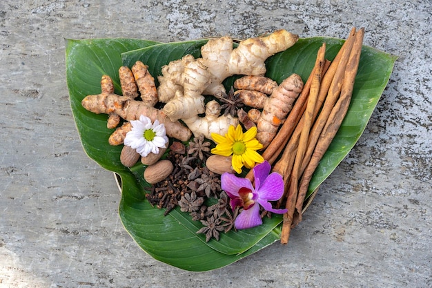 Fragrant spices on a green leaf closeup top view Indonesia