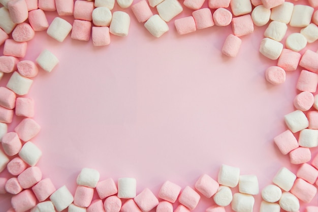 Photo frame background made of marshmallows . the concept of childhood