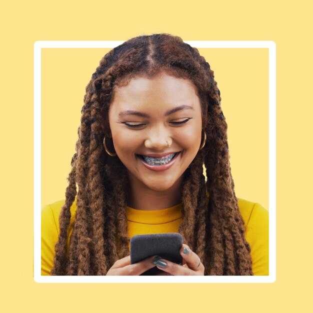 Photo frame black woman and smartphone for social media online reading and smile on studio background border african american female and girl with cellphone connection and typing for text and chatting