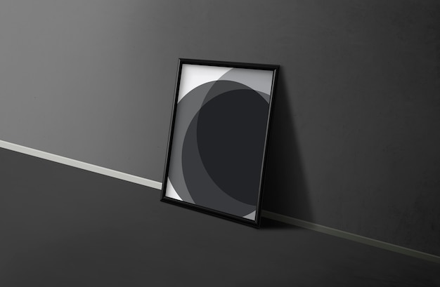 Photo frame by a black wall