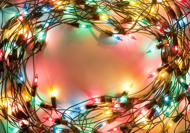 Frame of colorful Christmas lights. Decorative garland