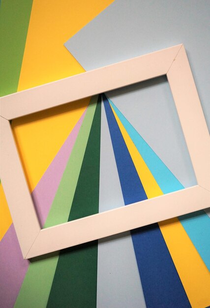 Photo frame on colorful papers