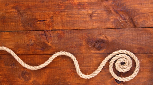 写真 木製の背景にロープで構成されるフレーム