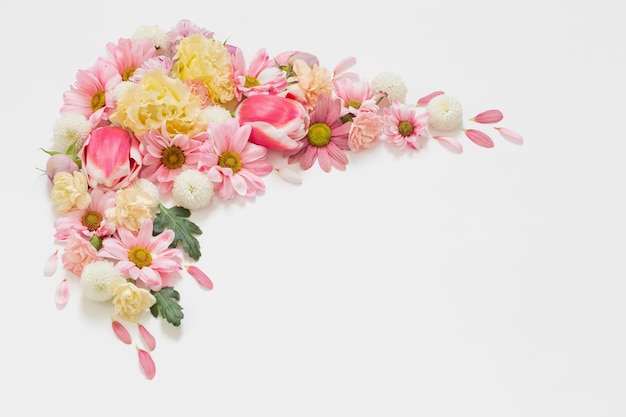 Frame of flowers on white background