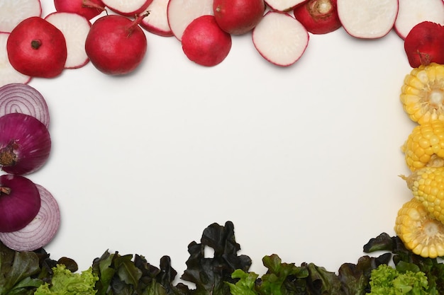 Frame of fresh vegetables on white background Healthy eating vegetarian food and nutrition concept