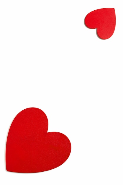 Фото Рамка символ любви украшения на день святого валентина, вид сверху красные окрашенные сердца