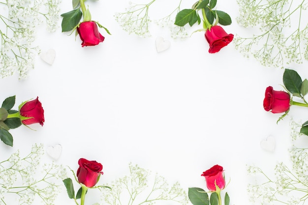 Frame made of red roses top view