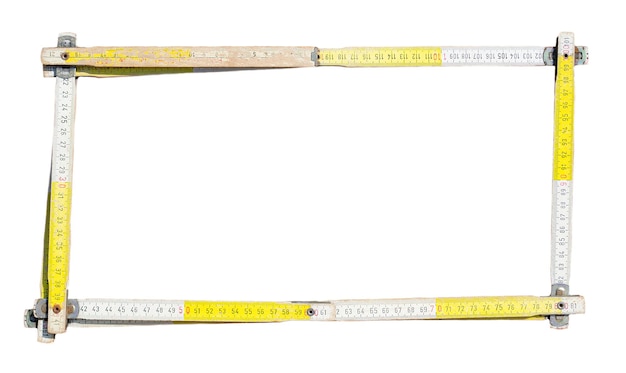 Frame made with a construction meter on white background