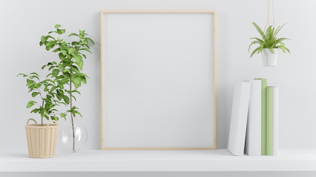 Frame mock up op een plank met groene planten een decoratie 3D-rendering