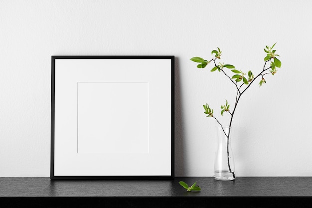 Frame mockup Poster with plant in vase