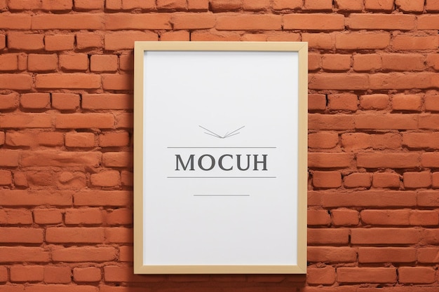 Frame mockup on a red brick wall