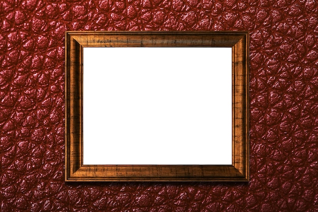 Frame op een textuur bruine muur. geïsoleerd op wit