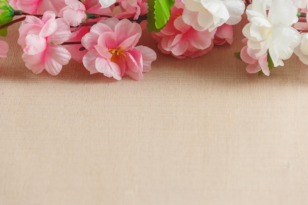 Frame of spring flowers background