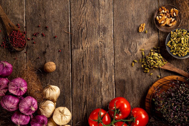 Frame of vegetables on wooden background