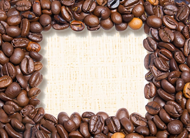 frame with coffee cup and coffee beans