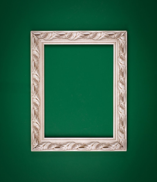 Foto cornice con disegno floreale isolato su sfondo verde