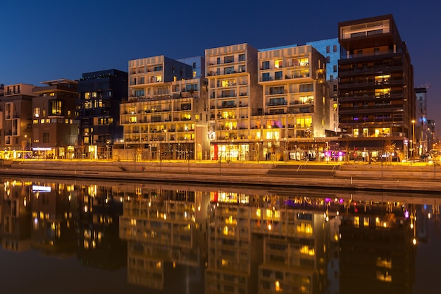 FRANCE, LYON - FEBRUARY 19: The Confluence District in Lyon, France on February 19, 2013. New district with an modern architecture in the place of the old port. Night shot